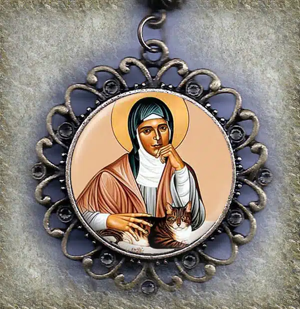 St. Gertrude with her cat necklace, by MarysPrayers on Etsy